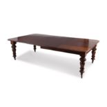 A Victorian mahogany extending dining table, late 19th century the rectangular top with moulded edge
