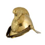 An English 'Merryweather' brass fireman's helmet, early 20th century with embossed decoration