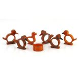 A collection of Bakelite napkin rings, 1930s five moulded as chickens, one as a duck and one