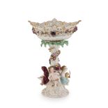 A large Meissen polychrome and gilt centrepiece depicting the Four Seasons, 1924-1934 the openwork