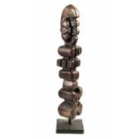 Hannes Harrs, TOTEM, inscribed with the artist's initials and dated 69, carved wood, height: 70cm (