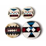 A PAIR OF ZULU EAR PLUGS with typical inlaid vinyl geometric decoration; and Another Two Earplugs,