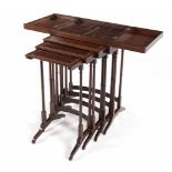 A VICTORIAN BACKGAMMON GAMES TABLE the hinged top enclosing a playing surface, three nesting