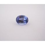 AN UNMOUNTED OVAL MIXED-CUT TANZANITE weighing 1.78cts Accompanied by an EGL Tanzanite