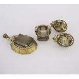 A COLLECTION OF SMOKY QUARTZ JEWELLERY ITEMS comprising: a ring, size O, a pendant and a pair of