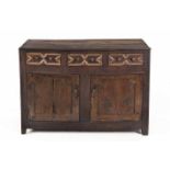 AN OAK SERVER, 18TH CENTURY the moulded rectangular top above three beaded frieze drawers, a pair of