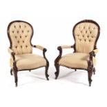 A VICTORIAN MAHOGANY AND UPHOLSTERED GRANDFATHER AND GRANDMOTHER CHAIR each padded button-back