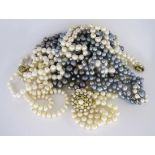 A MISCELLANEOUS GROUP OF EIGHT PEARL NECKLACES of various sizes, shapes, colours and lengths,