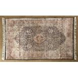 AN INDO-PERSIAN RUG,MODERN the pale indigo-blue field with a small madder medallion, ivory