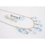 A PAIR OF BLUE TOPAZ AND DIAMOND PENDANT EARRINGS each articulated, suspending a briolette-cut