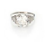 A DIAMOND RING claw set to the centre with an old-cut diamond weighing approximately 2.66cts, the