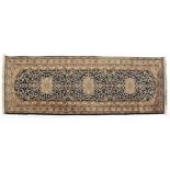 AN INDO-PERSIAN RUNNER,MODERN the deep indigo-blue field with three floral ivory star medallions,
