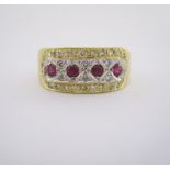 A GEM-SET RING centred with a row of four circular mixed-cut rubies, embellished with brilliant-