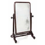 A VICTORIAN MAHOGANY CHEVAL MIRROR the rectangular rounded plate within a conforming surround,