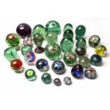 A GROUP OF TWENTY-THREE PAPERWEIGHTS of various design, size and shape, the largest 15cm diameter;