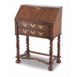A GEORGE III CROSSBANDED AND INLAID BUREAU-ON-STAND, 19TH CENTURY the rectangular top above a hinged