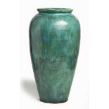 A LINNWARE JARDINIERE, 1940s the tapering ovoid body with overall mottled green and turquoise glaze,