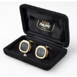 A CASED PAIR OF GOLD 'NAUTILUS' CUFFLINKS, PATEK PHILIPPE each with sapphire crystal and ribbed