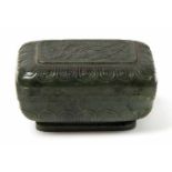 A CHINESE CARVED SPINACH-GREEN JADE BOX AND COVER rectangular with rounded corners, decorated with a