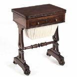 A VICTORIAN ROSEWOOD GAMES TABLE the baize-lined hinged rectangular swivel top enclosing a