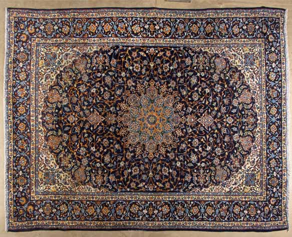 AN ISPAHAN CARPET,PERSIA,MODERN the deep indigo-blue field with a sky-blue floral star medallion,