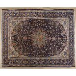 AN ISPAHAN CARPET,PERSIA,MODERN the deep indigo-blue field with a sky-blue floral star medallion,