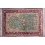 AN ISPAHAN PART-SILK PRAYER RUG,PERSIA,MODERN the turquoise mehrab with an ascending design of