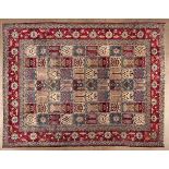 A TABRIZ CARPET,PERSIA,MODERN the field divided into squares, each containing various multi-coloured