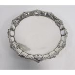 A GEORGE III SILVER SALVER, ELIZABETH COOKE, LONDON, 1763 the circular body with gadrooned and shell