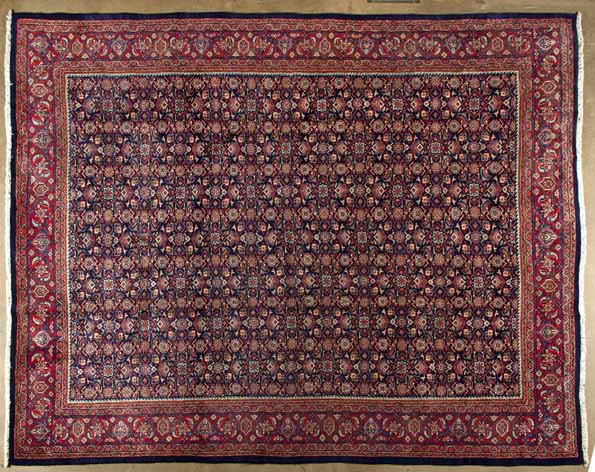 A FEREGHAN CARPET, WEST PERSIA,MODERN the indigo-blue field with an overall multi-coloured herati
