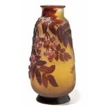 A GALLE BLOWN-OUT CAMEO GLASS VASE, CIRCA 1900 the tapering ovoid body overlaid and acid-etched in