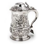 A GEORGE III SILVER TANKARD, SAMUEL WHITFORD I, LONDON, 1764 the baluster body chased with scrolling