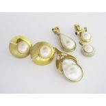 A PAIR OF MABÉ PEARL EARRINGS each of domed form with textured detail, mounted with mabé pearls