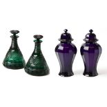 A PAIR OF CUT GREEN-GLASS SHIP DECANTERS, CIRCA 1900 each tapering body cut with bands of lozenges