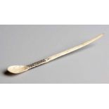 A CARVED ZULU BONE SNUFF SPOON the handle with geometric decoration 16,5cm long (1)
