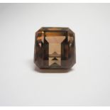 AN UNMOUNTED EMERALD-CUT ORANGE-PINK TOURMALINE weighing 10.72cts Accompanied by a certificate