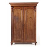 A VICTORIAN MAHOGANY WARDROBE the outset cornice above a plain frieze, a pair of panelled doors