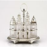 A VICTORIAN SILVER CRUET-SET, WALTER & JOHN BARNARD, LONDON, the stand of oval form with scroll