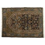 A QUM PRAYER RUG, PERSIA MODERN the deep blue “mehrab” with twin columns, one directional multi