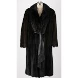A BLACK FULL LENGTH MINK COAT An incredible vintage fur coat in magnificent condition. 3 closures
