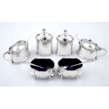 A CASED GEORGE V SILVER CRUET-SET, WALKER & HALL, SHEFFIELD each of ovoid form, comprising: two