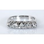 A DIAMOND RING centred with a line of round brilliant-cut diamonds weighing approximately 0.48cts in