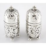 A PAIR OF VICTORIAN SILVER SALT AND PEPPER CASTERS, HORACE WOODWARD & CO. LTD., LONDON, each
