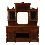 A VICTORIAN MAHOGANY DRESSER in two parts, the superstructure applied with three mirrors and three