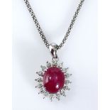 A STAR RUBY AND DIAMOND PENDANT centred with a cabochon star ruby weighing approximately 4.82cts