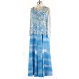 A BLUE BEADED EVENING GOWN A beautiful pale blue chiffon gown with matching scarf. Worn over the