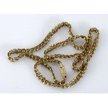 A 9CT GOLD NECKLACE composed of stylised links, with textured push clasp, approximately 460mm in