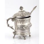 A FRENCH SILVER MUSTARD POT, PARIS the cylindrical body chased with bands of decorative motifs and