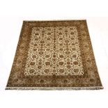 A TURKISH CARPET, MODERN the ivory field with an overall design of palmettes, flower heads and vines