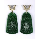 A PAIR OF SERPENTINE EARRINGS each stylised surmount set with round brilliant-cut diamonds